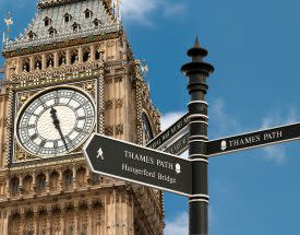 Signpost showing Thames Path in front of Big Ben