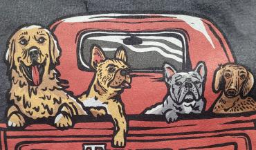 Dogs featured on Twisted Fork merch in Port Charlotte, Florida