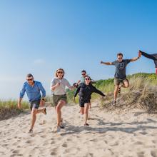 Group jump on the beach