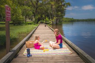 Having a picnic on the boardwalk at Fairview-Riverside State Park