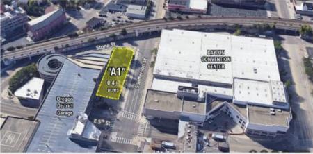 An aerial view of the Dayton Convention Center and Oregon District Parking Garage, showing the proposed location of the new Convention Center Headquarter Hotel.