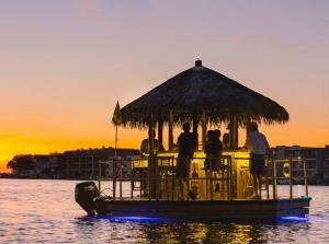 Cruisin' Tikis Charlotte Harbor - Sunset Silhouettes on the Tiki Boat