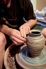 Eck McCanless Pottery throwing pottery