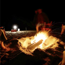 A brightly lit beach fire on the beaches of the Outer Banks.