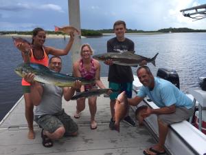 Family Posing With Fish On A Daytona Beach Charter