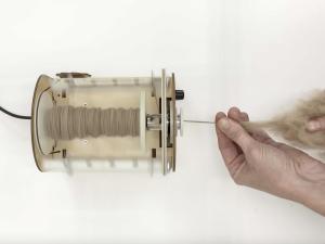 Laura Splan spinning yarn in her studio-2019-Courtesy of the Artist
