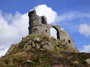 Kidsgrove Mow Cop folly with blue sky