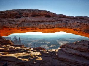 Mesa Arch backlit by the sun in Canyonlands National Park.