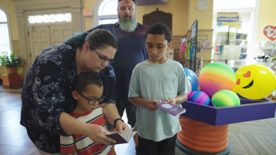 A family of four visit Fayetteville's Fascinate-U Children's Museum with their Cumberland County Destination Passport