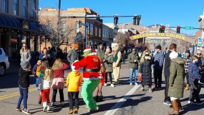 Holiday Characters and families share the holiday season by gathering on Washington Avenue, Golden Colorado's main street.