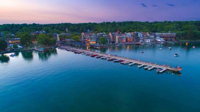 Overhead photo of town of Skaneateles, Skaneateles Lake and the Pier at dusk