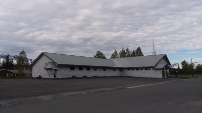 a church with a steeple in a small town