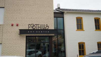 Foothills Art Center sign at the newly remodeled Astor House in downtown Golden