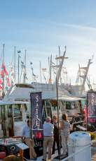 Boats at the wharf for the Newport Boat Show.
