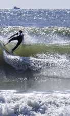 Surfer riding a wave