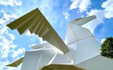 Close up of a "folded" metal Pegasus sculpture in the internationally-renowned Origami in the Garden, coming to Peace River Gardens in September of 2025.