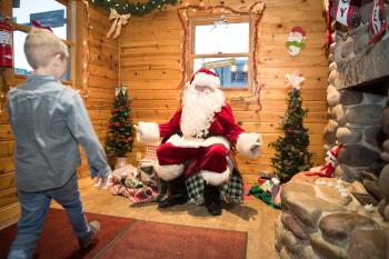 Kid Walking Towards Santa