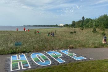Volunteers helping SWP at Clark Lambros beach in Marquette