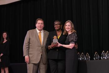 Excellence in Hospitality Awards EIH 2021 honoree Betty Walpool with Stacy Brown and Lt. Gov. Billy Nungesser