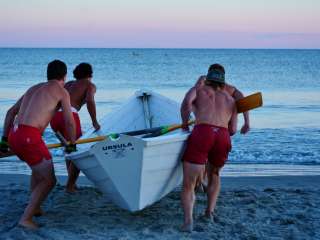 Lifeguards taking out a boat
