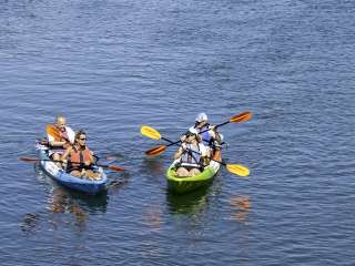 Couples kayak on Narrow River is South County, RI