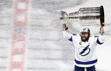 Nikita Kucherov Hoisting the 2020 Stanley Cup for the Tampa Bay Lightning