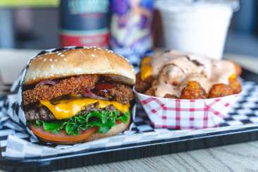 Burger and side at Malibus Burger Vegan Restuarant in Oakland California