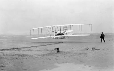 The Wright brothers' first powered flight on December 17, 1903