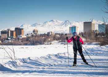 Skiers on the Coastal Trail near downtown Anchorage.