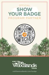Visit The Woodlands' rebranded "Show Your Badge" Partner Window Cling. A cream-colored badge with a dark green bar across the bottom. Text at the top reads, "OFFICIAL SHOW YOUR BADGE PROGRAM PARNTER" in light green and orange text. Below that is a large QR code and images of trees. Across the dark green bar is a white "Visit The Woodlands, Texas" logo.