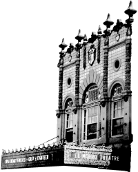 Black and white image of El Morro Theatre's ornate facade. Features arched windows and intricate details.