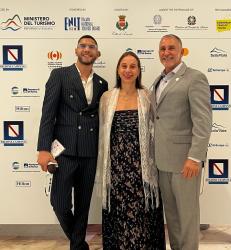 a woman and 2 men at  Global Youth Tourism Summit