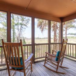 Cottage Porch View with Rocking Chairs