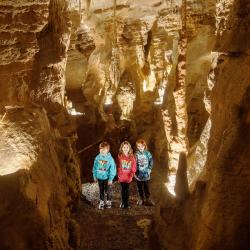 Picture of three kinds exploring Lincoln Cavers