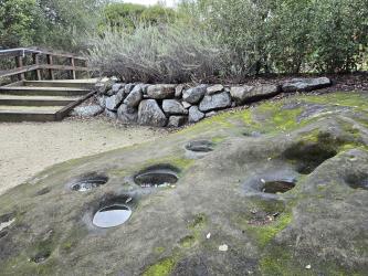 Native American mortar holes for grinding acorn