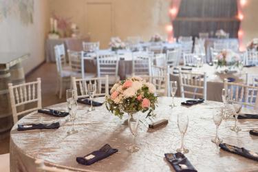 Formal event tables and place settings in Fortino Winery Barrel Room