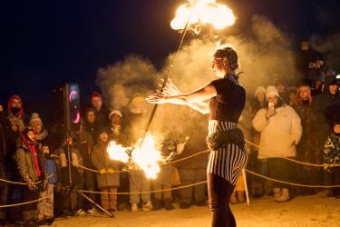 Fire dancers on the beach during Winterfest.