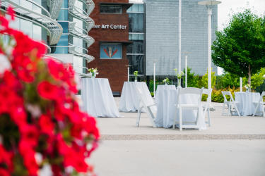 Tables and Chairs set up on Riverfront Plaza