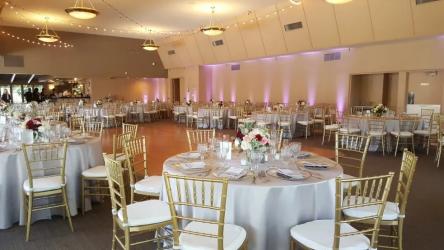 Round dining tables and decor surrounding dance floor
