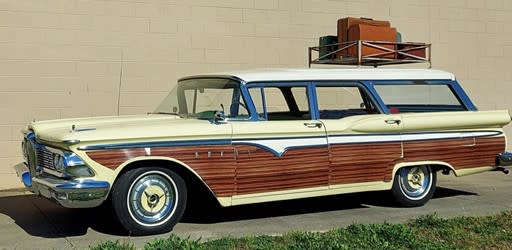 Griswold VACATION station wagon against wall