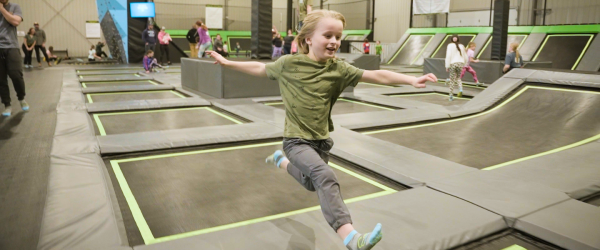 Boy jumps at Sawmill Trampoline Park