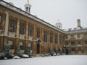Outside of Clare College Cambridge covered in a blanket of white snow
