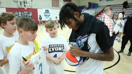 Jordan Hidleburg of the Indiana Lyons signs autographs for fans after a game. (Photo by TOPP Level Entertainment)