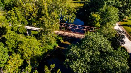 Aerial view of historic truss bridge and Big Walnut Creek at McCloud Nature Park. (Photo by Dave Novak)