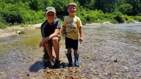 Boys exploring Big Walnut Creek at McCloud Nature Park