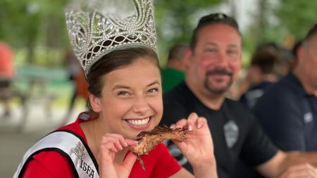 Princess enjoying ribs at the Hendricks County Rib-Fest; photo courtesy of the Hendricks County Rib-Fest Facebook Page