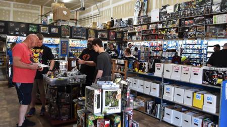 Customers check out a display at Hot Spot Collectibles and Toys (Photo courtesy of Hot Spot Collectibles and Toys Facebook)