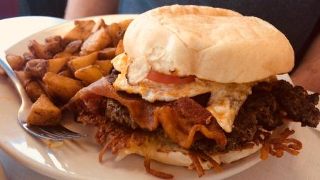 The Oasis Diner Brunch Burger is loaded with flavor!