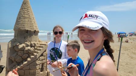 Kids building a sandcastle
