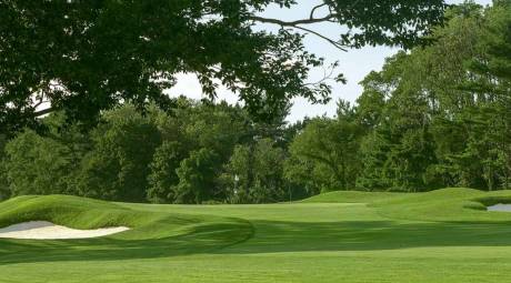 Golf course featuring sand bunkers at Philmont Country Club in Huntingdon Valley